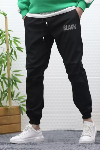 بنطال رجالي جاغر من قماش الباراشوت مقاوم للماء والرياح بتفاصيل عند الركبة