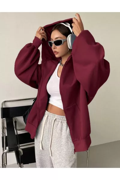 كنزة نسائية بأكمام بالون بسحّاب وتفاصيل على غطاء الرأس باللون العنابي