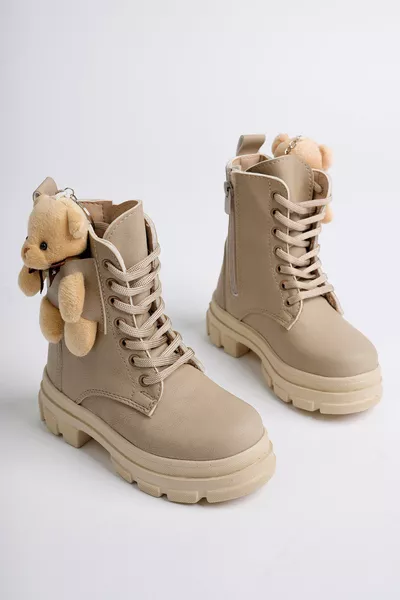 حذاء للبنات مقاوم للماء بضمان، بتصميم تشريحي، بنعل سميك، مزود بإكسسوار دب صغير، بسحّاب ورباط