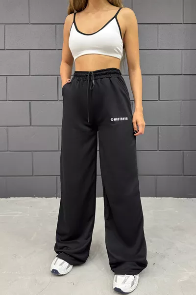 سروال رياضي نسائي واسع الساق مطبوع باللون الأسود