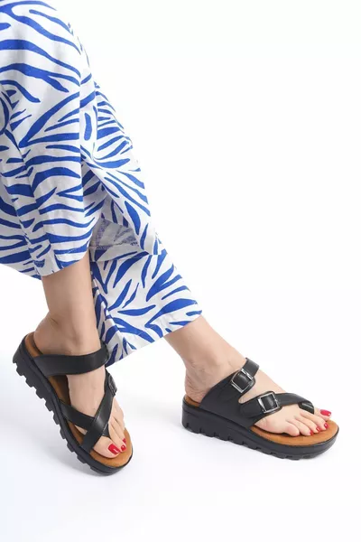black flip-flops with double buckles