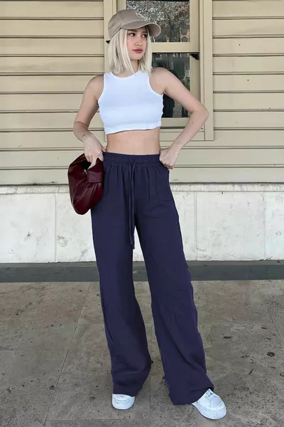 بنطلون نسائي عريض الساق باللون الأزرق الداكن 