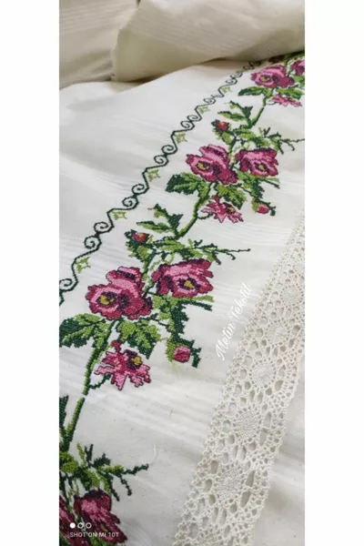 Beddengoedset met borduurwerk