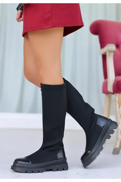 Bottes stretch détaillées en cuir verni noir