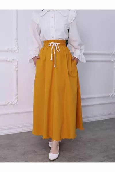 Jupe en gabardine Mevlana avec poches à glands