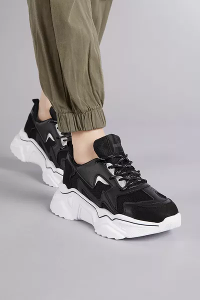 Zwart-witte sneakers voor dames Dnz