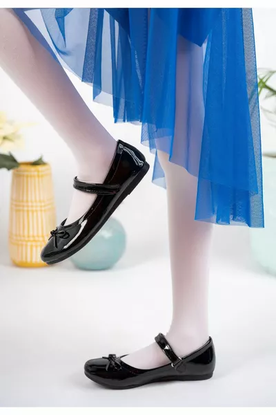 شارب القوس الأسود أحذية بنات