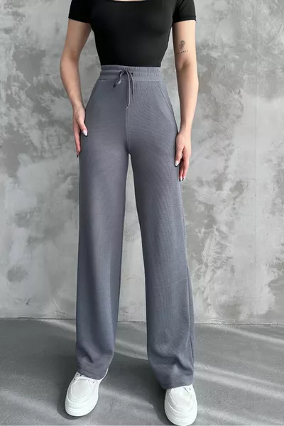 Pantaloni stagionali elastici in tessuto a costine a gamba larga da donna