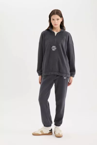 سروال رياضي بولار بقصة عادية، خصر برباط، حافة مطاطية، جيوب، مطبوع، طويل الطول WN