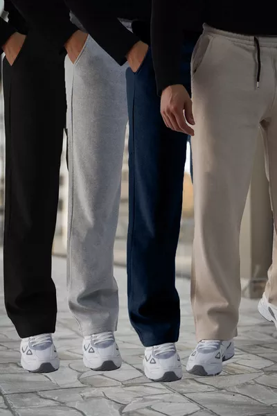 طقم رياضي مريح بأربعة قطع للجنسين باللون الأسود والرمادي والنيلي والبيج، قماش محبوك 2ip، بنطلون رياضي واسع ومريح