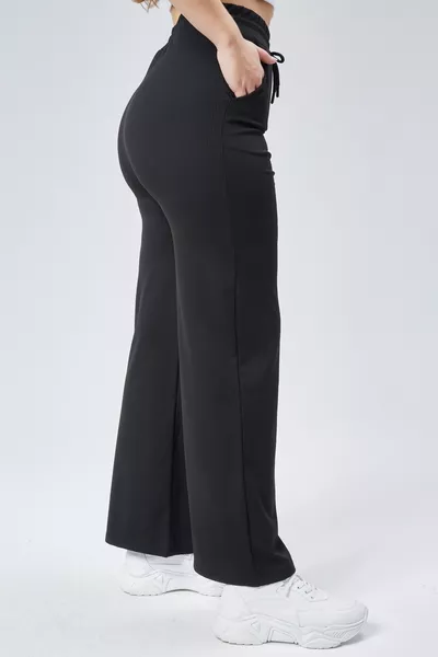 Curve Damen Schwarze Sweatpants mit Gummibund, zwei Taschen und gerippten Röhrenbeinen