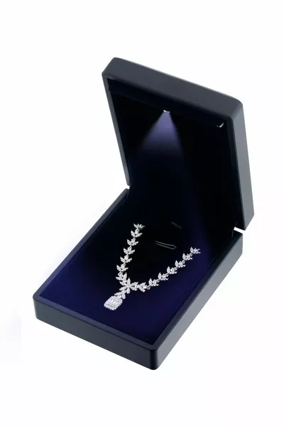 Diamond Model Baguette Stone Silver Necklace in a Lighted Box