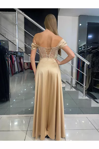 Evening dress with long slits with gold stones