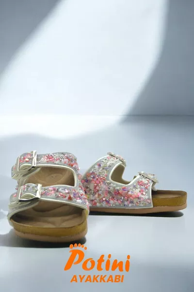 Ciabatte da donna in pietra naturale con doppia fibbia in pietra marina