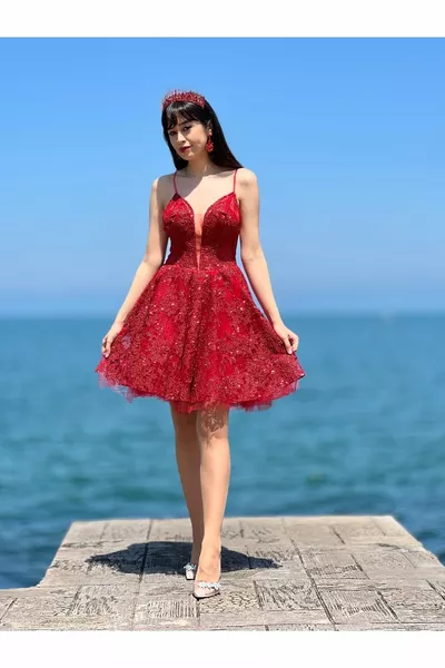 Rode mini-jurk met glitterstof en bandjes