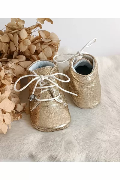 Золотые детские пинетки из натуральной кожи