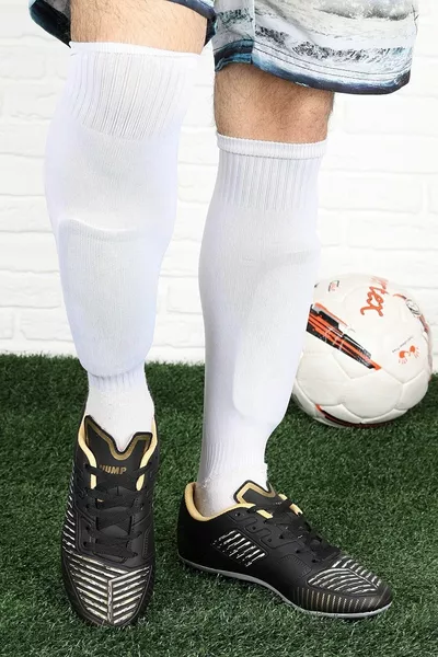  حذاء كرة قدم أسود أصفر منقوش Astroturf