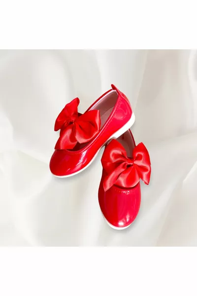 Балетки с красным бантом
