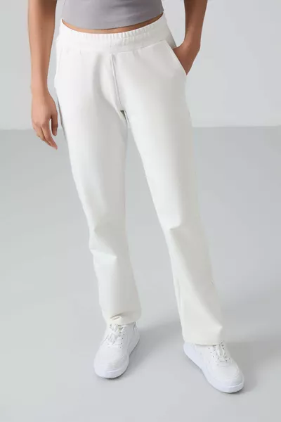 Pantaloni da donna comodi a vita alta con tasche e gamba classica colore ecru - 