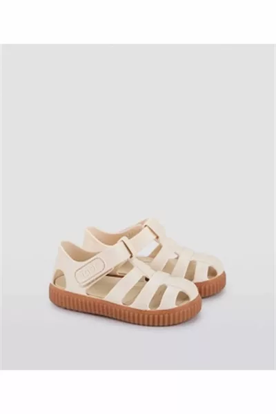 نيكو كاراميلو صنادل أطفال عاجي للجنسين