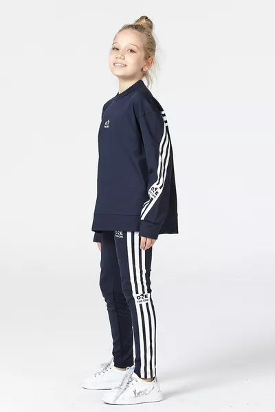 طقم بنطال ضيق وكنزة للبنات مع فتحة جانبية وتفاصيل شريط