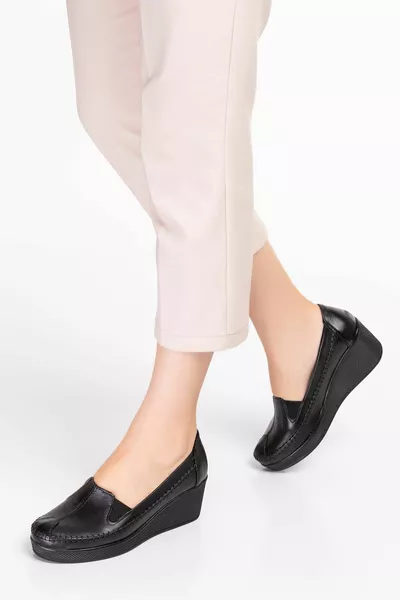  جلد طبيعي العظام المرأة منصة أحذية كعب