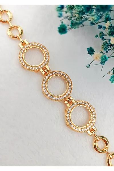 سوار ربع ثلاثي ، سوار سلسلة خاتم ربع ذهبي يرتديه