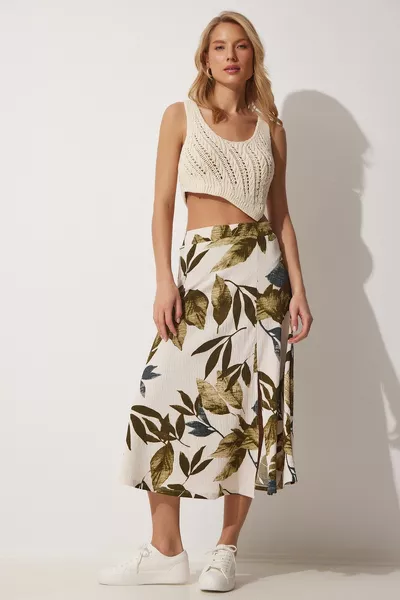 تنورة محبوكة صيفية منقوشة باللون الكريمي مع شقوق نسائية  