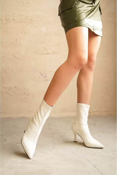 Bottes à talons pointus en matière extensible Lopez pour femme - Blanc