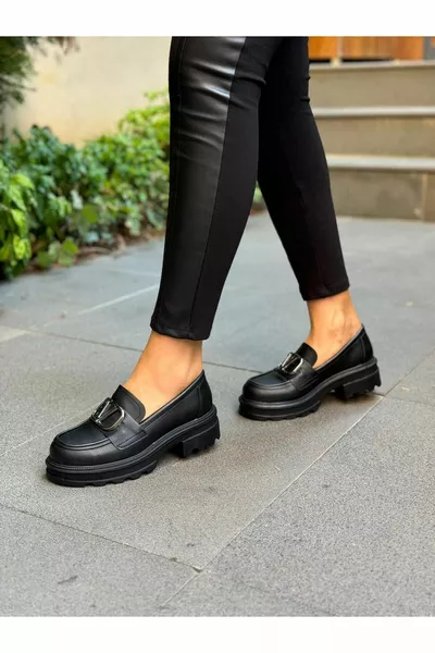 ديفا أسود الجلد مشبك المرأة أحذية عارضة