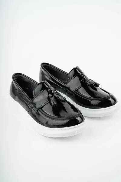 Chaussures à pompons en cuir verni noir pour garçon