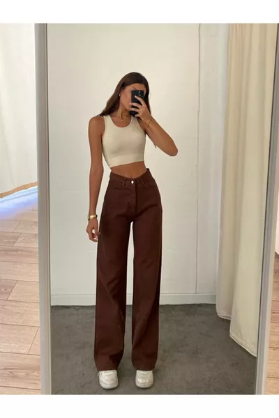 Pantalon palazzo en jean marron des années  super taille haute avec stretch. (SUPER HAUTE) Jambe large