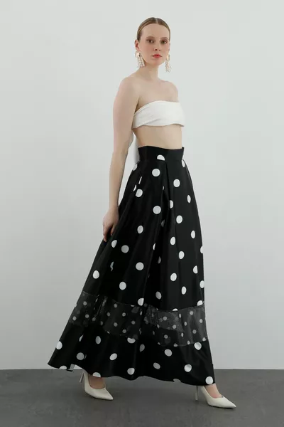 Jupe taille haute noire à motifs à pois