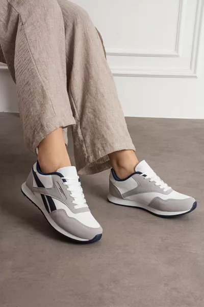 حذاء رياضي يومي مريح للجنسين برباط مرن ونعل مرن