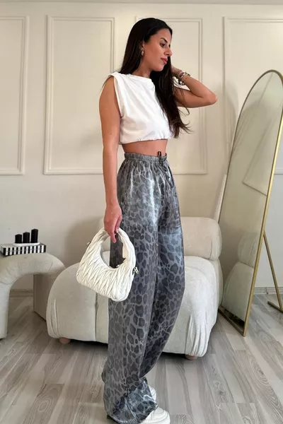 Pantaloni a gamba larga con motivo leopardato grigio