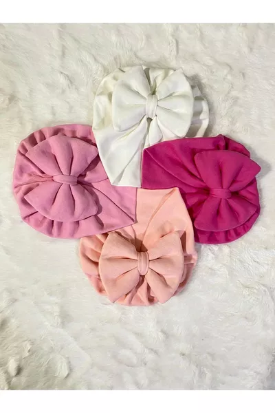 Комплект от 4 едноцветни бебешки шапки с панделка