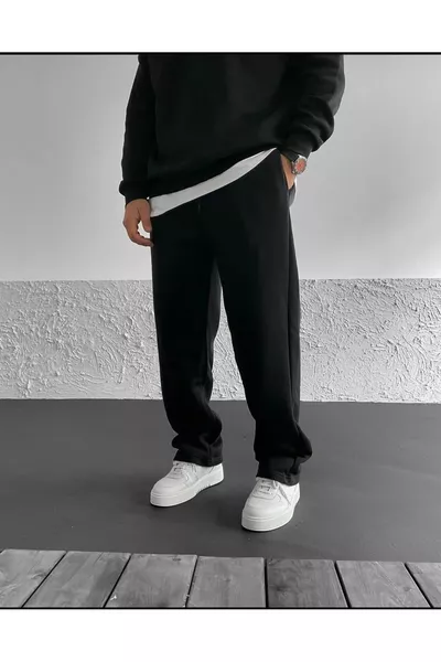 بنطال رياضي واسع أسود بقصة أرجل فضفاض للشتاء