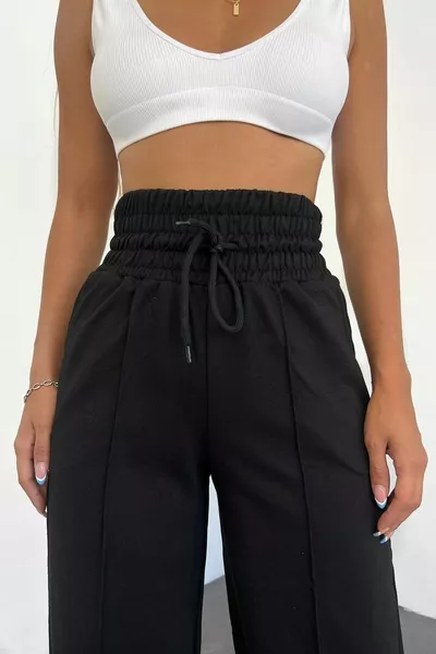 Pantaloni della tuta da donna neri a vita extra alta con gamba larga