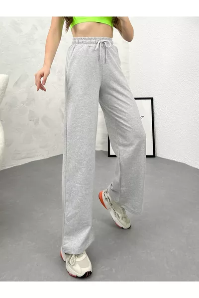 بنطال رياضي نسائي رمادي فضفاض واسع مريح بفصوص جانبية وجيوب جانبية