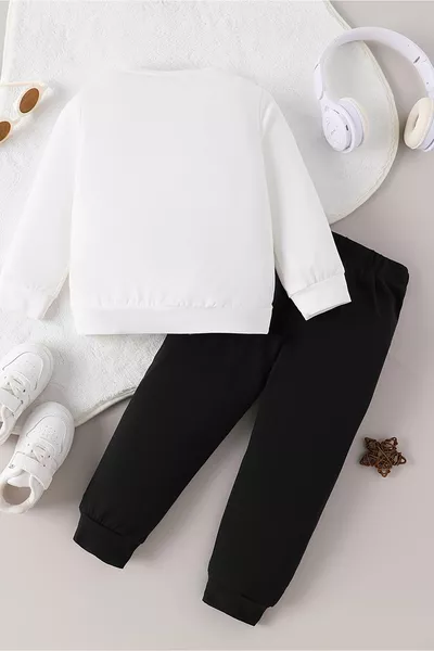 طقم أطفال من قطعتين بطبعة نقشة الفهد على شكل فيونكة للموسم الجديد 