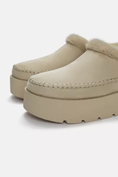 Faux fur and platform slippers