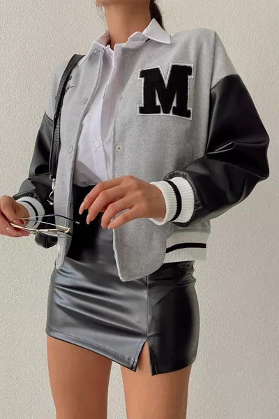 نسخة طبق الأصل من الأسود شق تنورة جلدية صغيرة