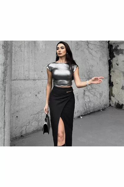 Zwarte taille met gedetailleerde splitrok