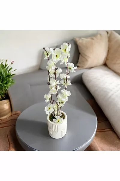 Изкуствен японски черешов цвят с мъх върху истински камък в бетонова саксия, саксия, аранжировка, домашна декорация