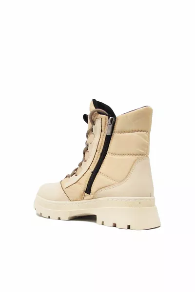 . حذاء ثلجي نسائي حصري باللون البيج