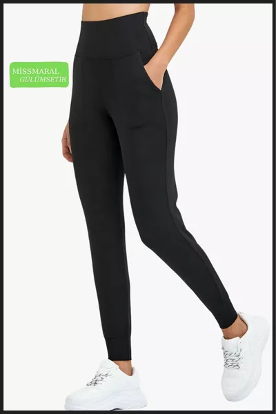 سروال رياضي نسائي أسود Curve Jogger قماش غوص خصر عالي مع جيوب مزدوجة 