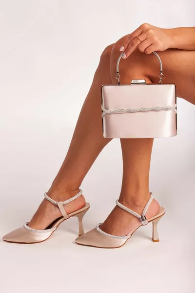 Combinatie van nertssteenschoen en tas voor dames