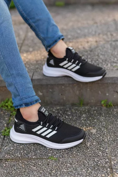 الرجال الأسود المرن أربعة خطوط العظام أحذية رياضية عارضة 