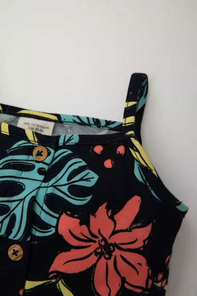 Meisjesbaby met print, korte tuinbroek met bandjes SM