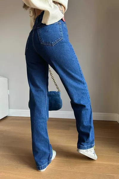 Jean en denim Palazzo à taille haute et jambes larges Tugy en bleu foncé avec stretch